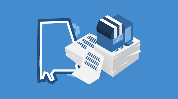 A map shape of the state of Alabama positioned next to a blue storefront on top of stacks of business documents.