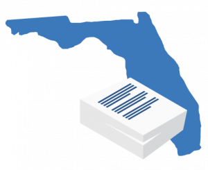 A large blue map of Alabama positioned behind a stack of white business documents